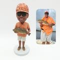 Custom bobbleheads, custom fisherman bobbleheads, custom fishing bobbleheads, fishing souvenir prizes, gifts for fishing enthusiasts